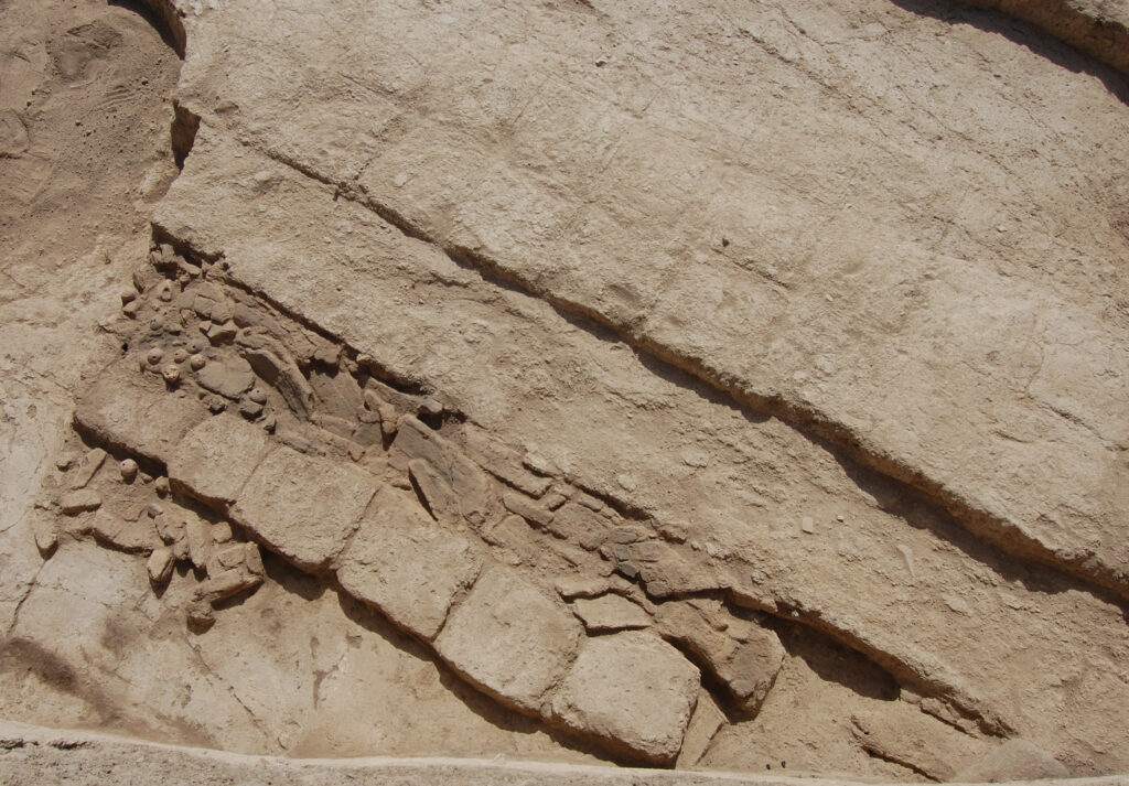 Remains of a wooden weaving frame.